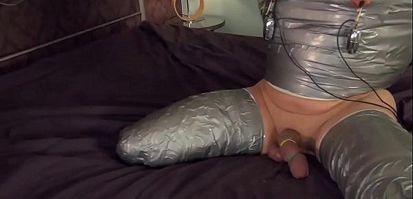  Harsh femdom wanks off mummified submissive